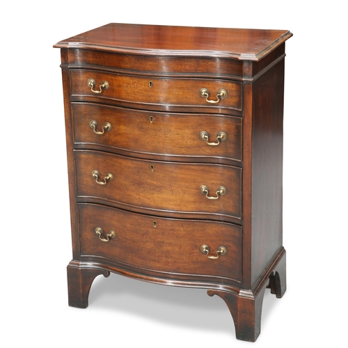 582 - A GEORGE III STYLE MAHOGANY SERPENTINE BACHELORS CHEST, EARLY 20TH CENTURY, the hinged top opening ... 