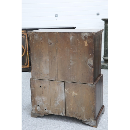 585 - AN EARLY 18TH CENTURY SMALL WALNUT CHEST ON CHEST, EAST YORKSHIRE, the upper section with two short ... 