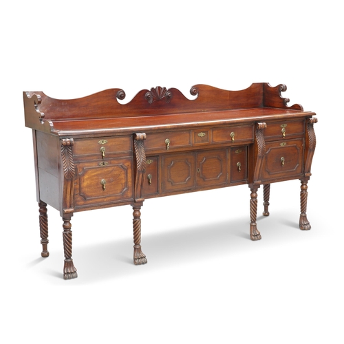 587 - AN IRISH MAHOGANY SIDEBOARD, CORK, CIRCA 1820, the moulded rectangular top with gallery back and gro... 