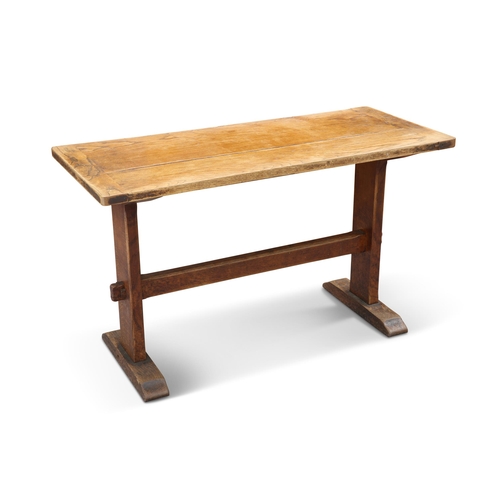 608 - AN EARLY 19TH CENTURY OAK AND ELM TAVERN TABLE, the cleated rectangular top raised on a trestle base... 