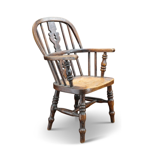 613 - A 19TH CENTURY ELM AND OAK CHILDS WINDSOR CHAIR, with pierced splat and spindle back, raised on bal... 