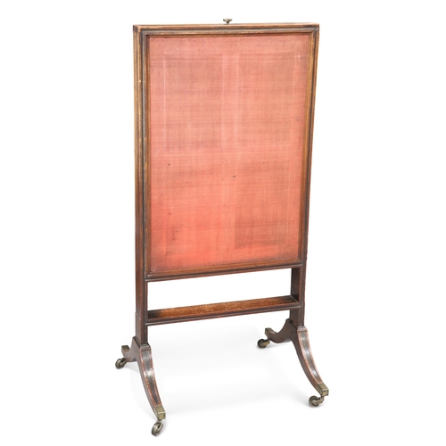 618 - A 19TH CENTURY MAHOGANY FIRESCREEN, the moulded rectangular frame with ebonised inlay, three pull-ou... 