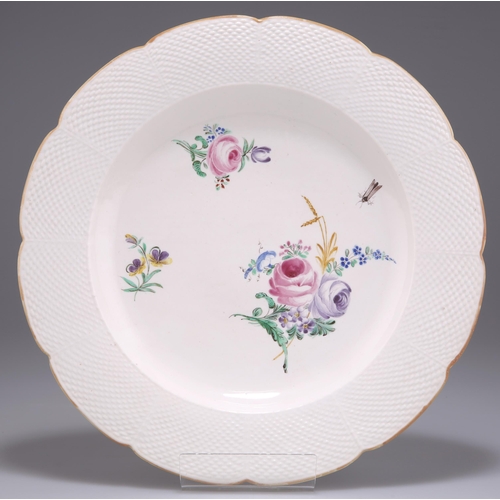 62 - A CHANTILLY PLATE, CIRCA 1780, painted with three floral sprigs and an insect within an osier-moulde... 