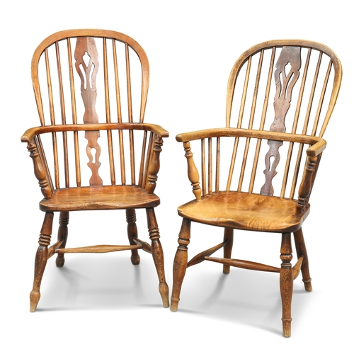 627 - A NEAR PAIR OF YEW AND ELM WINDSOR ARMCHAIRS, 19TH CENTURY, each with high-back and ring-turned balu... 