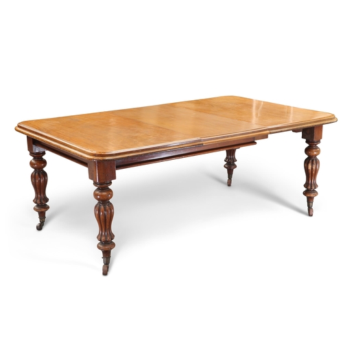 644 - A VICTORIAN MAHOGANY EXTENDING DINING TABLE, the moulded rectangular top with wind-out action enclos... 