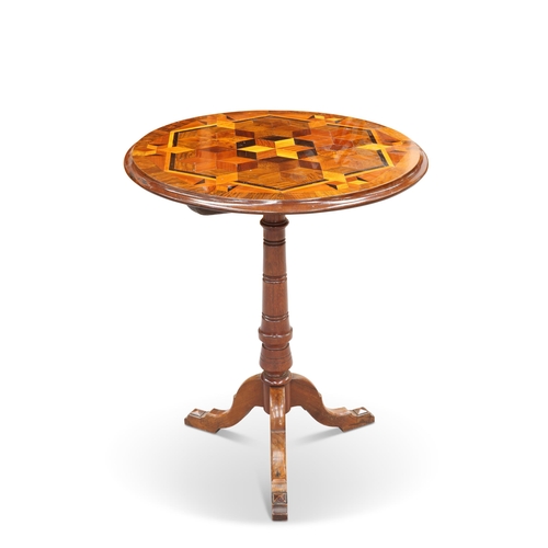 648 - A VICTORIAN PARQUETRY TRIPOD TABLE, the moulded circular top inlaid with various woods forming a geo... 