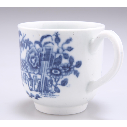 66 - A WORCESTER COFFEE CUP, CIRCA 1765, underglaze blue decorated with the 'Plantation' pattern, S.H. Wi... 