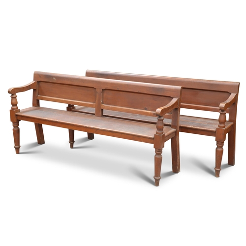 661 - A PAIR OF VICTORIAN SCUMBLED PINE BENCHES, each with two-panel back and turned tapering forelegs. (2... 