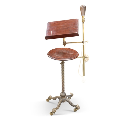 664 - A LATE VICTORIAN BRASS AND MAHOGANY READING STAND, with adjustable reading slope and light fitting, ... 