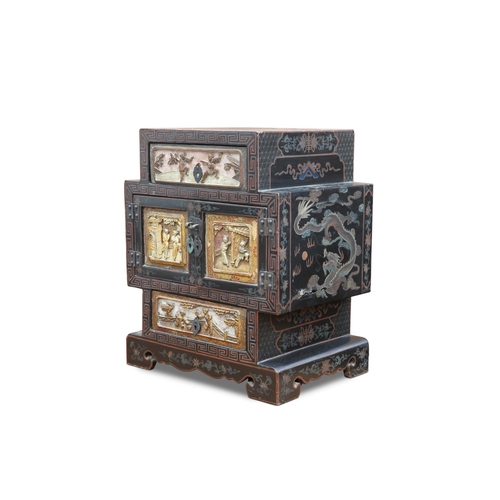 679 - A LACQUER TABLE CABINET, EARLY 20TH CENTURY, fitted with a pair of drawers and a pair of cupboard do... 