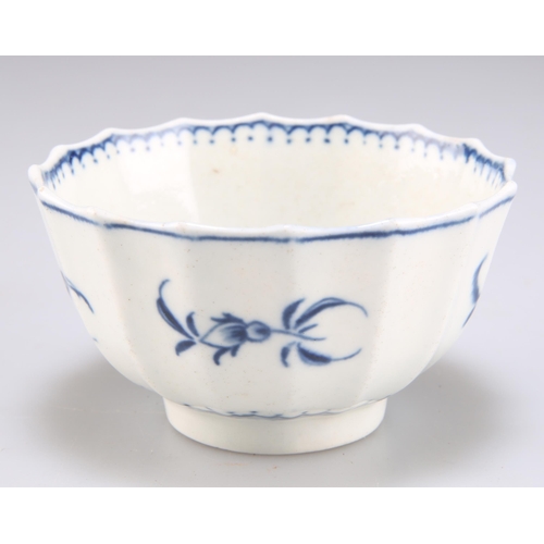 68 - A WORCESTER TEA BOWL, CIRCA 1775, faceted, decorated in underglaze blue with the 'Gilliflower' patte... 