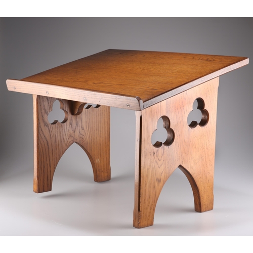 684 - AN OAK TABLE-TOP LECTERN, the ecclesiastical book stand with gothic arch and trefoil carving to the ... 