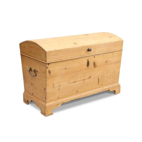 685 - A PINE DOME-TOP CHEST, of slightly tapering rectangular form, fitted with iron carrying handles and ... 