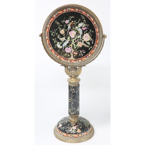 696 - A BRASS-MOUNTED CHINOISERIE TABLE MIRROR, the adjustable circular mirror enamel painted to the rever... 