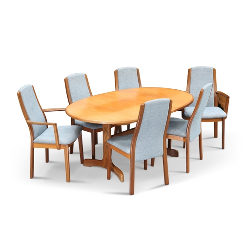 707 - A G-PLAN TEAK EXTENDING DINING TABLE AND SIX CHAIRS, the table with rounded ends, the chairs includi... 