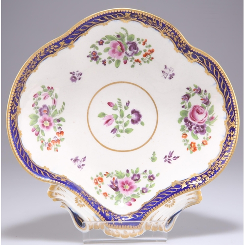 71 - A WORCESTER SÈVRES STYLE PORCELAIN DISH, CIRCA 1780, lobed shell form painted with floral sprays wit... 