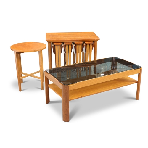 710 - A MYER TEAK AND SMOKED GLASS COFFEE TABLE, CIRCA 1970S, with shelf stretcher, unmarked; together wit... 