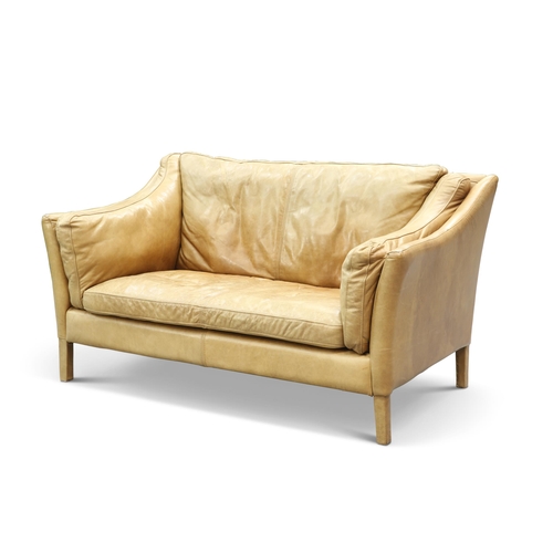 715 - A CONTEMPORARY BARKER & STONEHOUSE BROWN LEATHER TWO-SEATER SETTEE, raised on square-section legs. 1... 