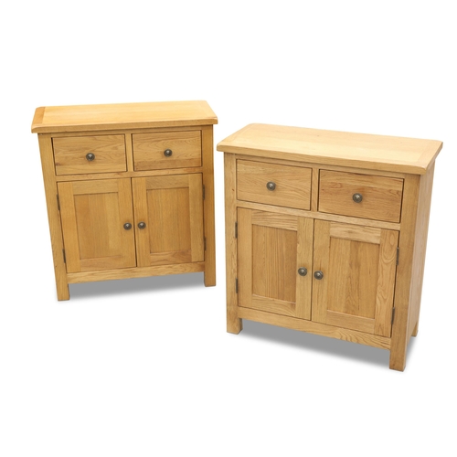 719 - A PAIR OF CONTEMPORARY OAK SIDE CABINETS, each fitted with a pair of drawers above a pair of cupboar... 