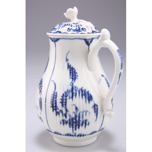 84 - A WORCESTER SPARROW-BEAK MILK JUG AND COVER, CIRCA 1770, of reeded baluster form, underglaze blue pa... 