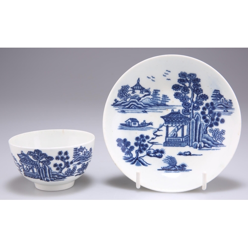 88 - A WORCESTER TEA BOWL AND SAUCER, CIRCA 1758, underglaze blue printed with the 'Man in the Pavilion' ... 