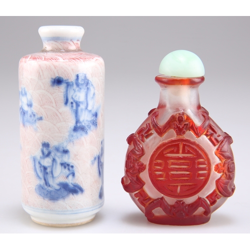 300 - TWO CHINESE SNUFF BOTTLES, comprising A CAMEO GLASS SNUFF BOTTLE, decorated with character symbols w... 