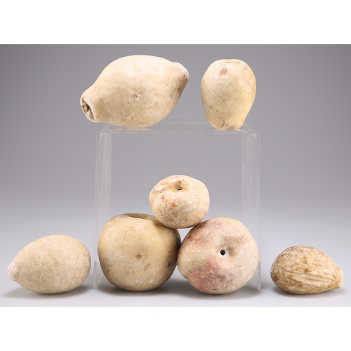 396 - A COLLECTION OF CARVED ALABASTER FRUIT, including lemon, apple, peach, etc., some with trace remains... 