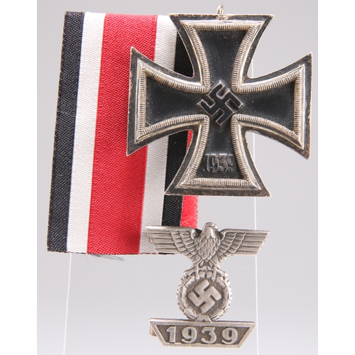 417 - A GERMAN 2ND CLASS IRON CROSS, and ribbon, together with a second award bar, the latter marked L/12.... 