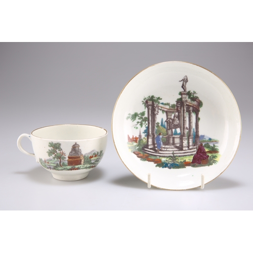 86 - A WORCESTER PORCELAIN 'EUROPEAN RUINS' TEACUP AND SAUCER, CIRCA 1765, printed and enamelled with fig... 