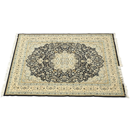 456 - A FINE PERSIAN CARPET, modern, the deep blue field with cream medallion and corners, the broad cream... 