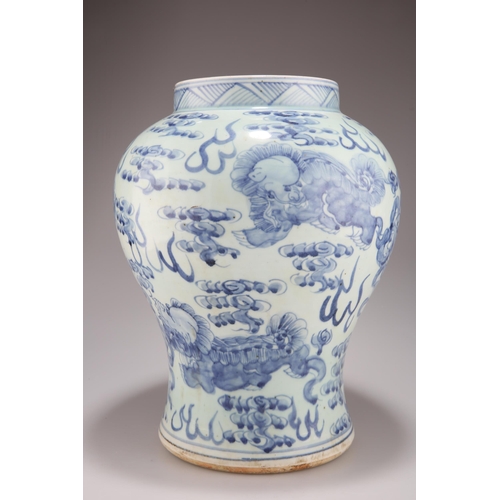 100 - A LARGE CHINESE BLUE AND WHITE VASE, of baluster form, painted in underglaze blue with qilins and cl... 