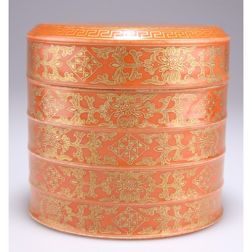 122 - A CHINESE GILDED BOX AND COVER, circular, moulded to simulate four stacking tiers, gilded with folia... 