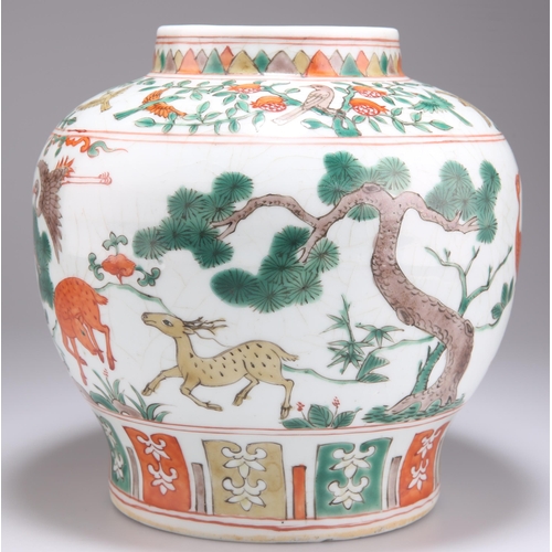 129 - A CHINESE FAMILLE VERTE VASE, possibly 18th Century, painted with cranes, birds, deer and prunus tre... 