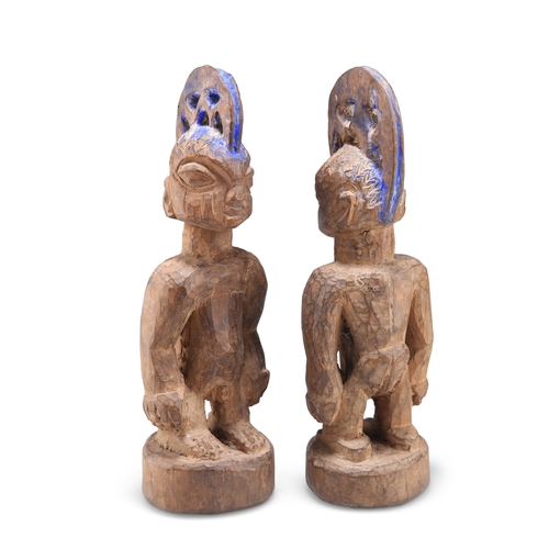 198 - A PAIR OF NIGERIAN YORUBA 'ERE IBEJI' TWIN MALE CARVED WOODEN FIGURES, EARLY 20TH CENTURY, the West ... 