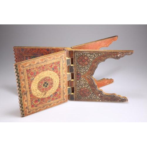 222 - AN ORNATELY PAINTED 19TH CENTURY QURAN STAND, painted to all sides with flowers and with script to t... 