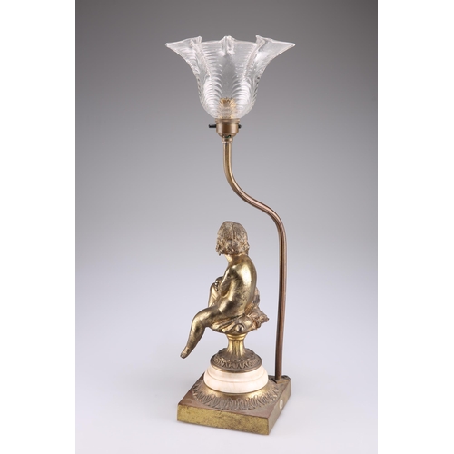 298 - A FRENCH GILT-BRASS FIGURAL TABLE LAMP, CIRCA 1900, with moulded clear-glass shade. 50.5cm high... 