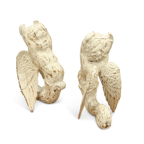 43 - A PAIR OF PAINTED CAST IRON WINGED CHERUBS, of scroll form. 43cm high