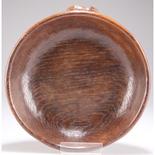 499 - ROBERT THOMPSON OF KILBURN, A MOUSEMAN OAK FRUIT BOWL, CIRCA 1940S, lightly adzed and with a carved ... 