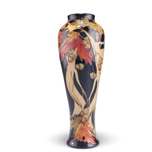 80 - A MOORCROFT LIMITED EDITION WOOD NYMPH PATTERN TUBE LINED POTTERY VASE, 117/150, designed by Kerry G... 