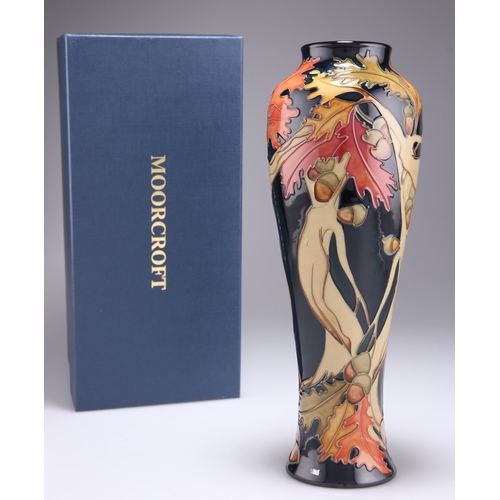 80 - A MOORCROFT LIMITED EDITION WOOD NYMPH PATTERN TUBE LINED POTTERY VASE, 117/150, designed by Kerry G... 