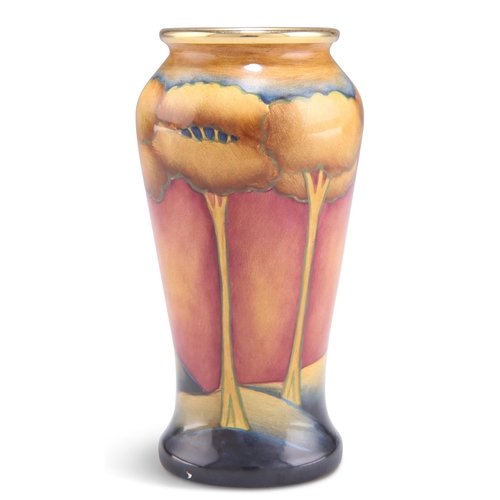 87 - A MINIATURE MOORCROFT EVENTIDE PATTERN VASE, tall baluster form with a gilt rim, printed marks and d... 