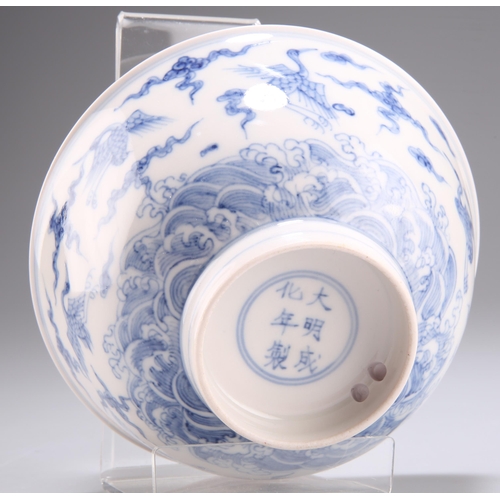 117 - A CHINESE BLUE AND WHITE BOWL, circular, painted in underglaze blue with cranes and clouds over a ro... 