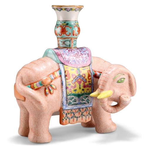 128 - A CHINESE FAMILLE ROSE 'ELEPHANT AND VASE' CANDLE HOLDER, the elephant is naturalistically modelled ... 