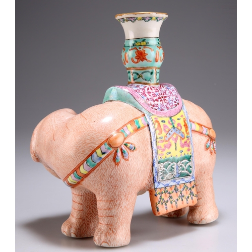 128 - A CHINESE FAMILLE ROSE 'ELEPHANT AND VASE' CANDLE HOLDER, the elephant is naturalistically modelled ... 