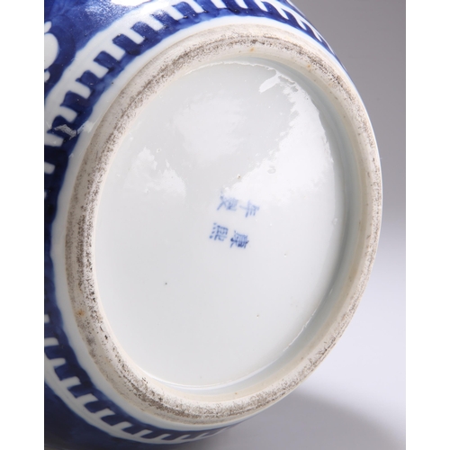 139 - A CHINESE BLUE AND WHITE GINGER JAR AND COVER, typical form, decorated with prunus, bears blue four ... 