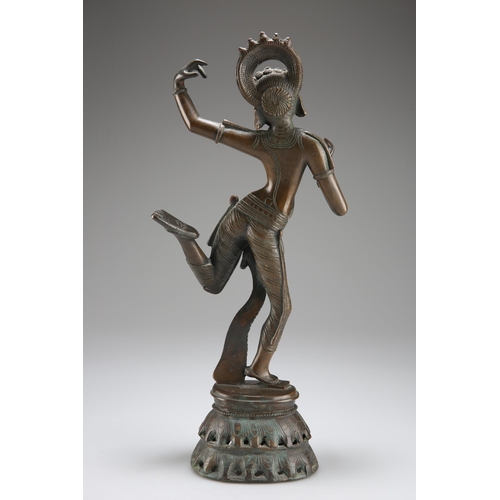 146 - A BRONZE FIGURE OF A DANCING GODDESS, PROBABLY 19TH CENTURY, modelled with her arms and left foot ra... 