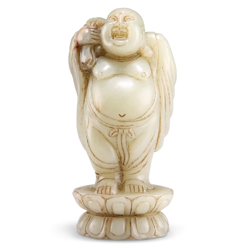 149 - A JADE BUDAI CARVING, standing upon a lotus throne with a sack slung over his shoulder. 12cm high... 