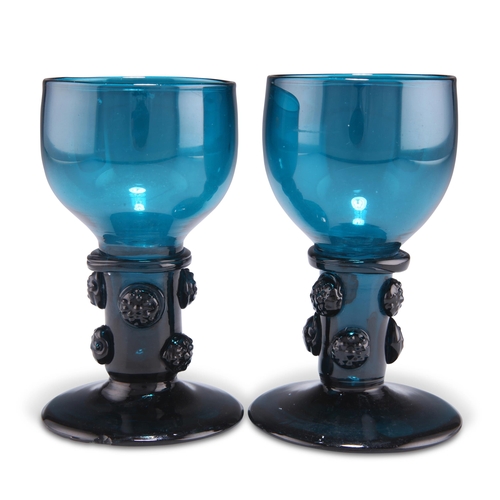 15 - A PAIR OF TURQUOISE GLASS ROEMERS, 19TH CENTURY, each with six strawberry prunts. (2)(11.5cm high)Th... 