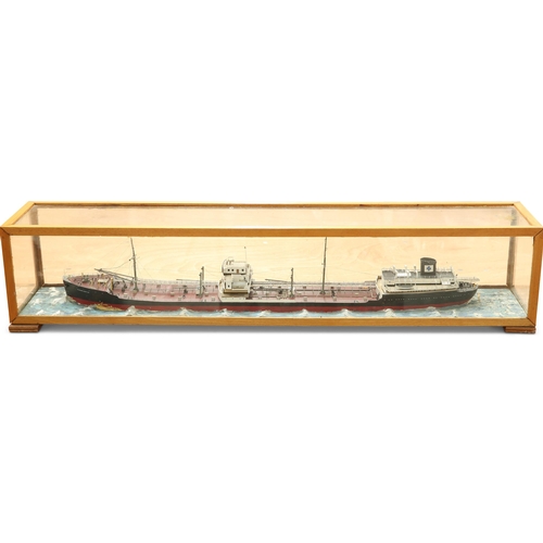 178 - A CASED SHIP DIORAMA OF M/T FERNCASTLE, the model of the Norwegian merchant tanker on a naturalistic... 