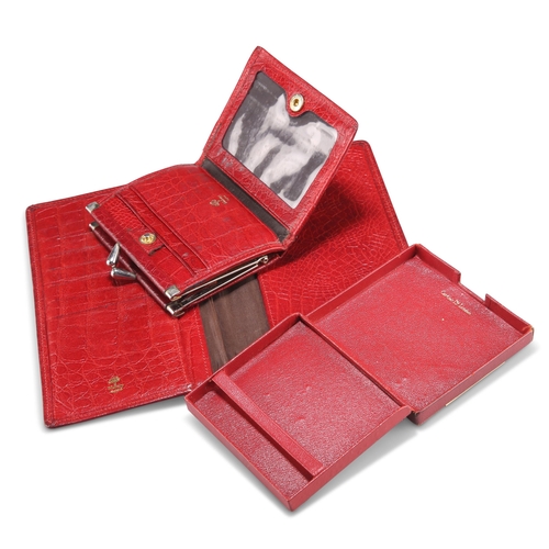 205 - A CARTIER RED LEATHER CIGARETTE CASE, rectangular form with applied gilt metal edges and 'JEAW' mono... 